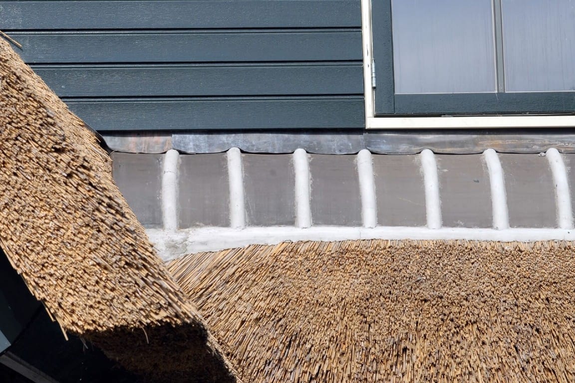 Rieten dak impregneren